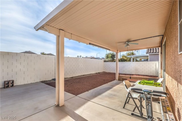 view of patio with ceiling fan