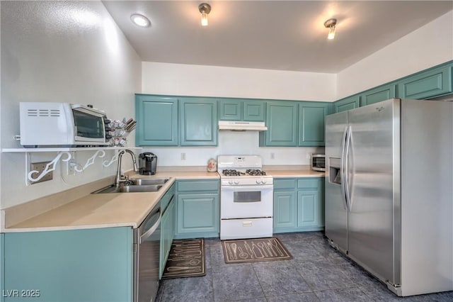 kitchen featuring appliances with stainless steel finishes and sink