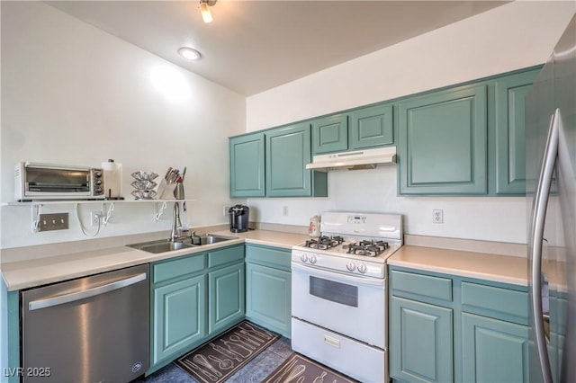 kitchen with sink and appliances with stainless steel finishes