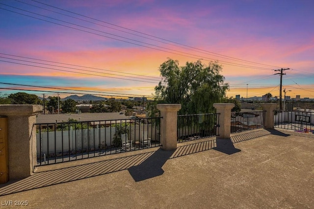 view of gate featuring fence