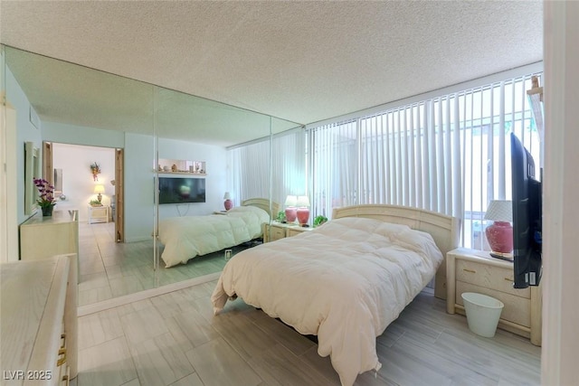 bedroom featuring a textured ceiling