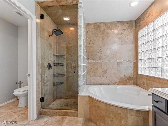 full bathroom with vanity, tile patterned floors, shower with separate bathtub, and toilet