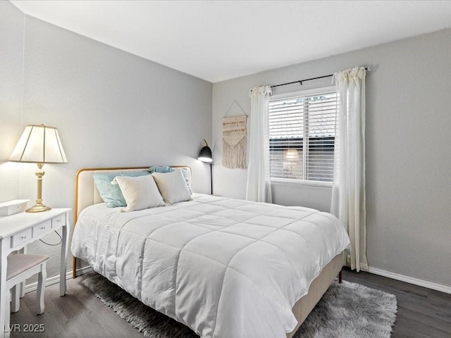 bedroom featuring dark hardwood / wood-style floors