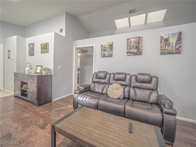 living room with dark hardwood / wood-style flooring and lofted ceiling