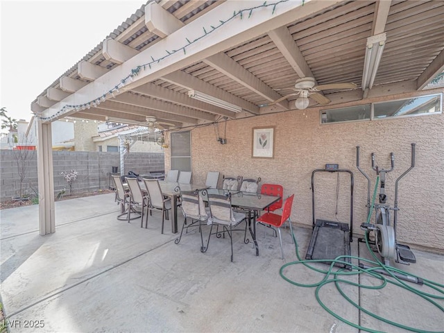 view of patio featuring ceiling fan