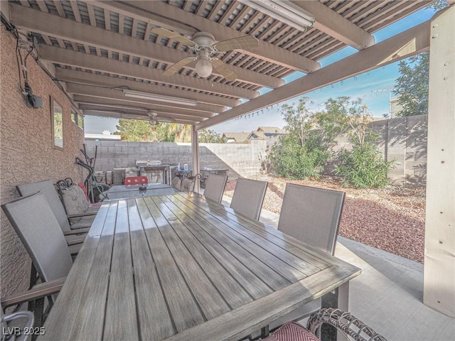 view of patio featuring ceiling fan