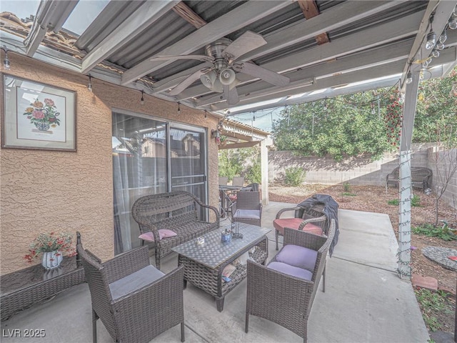 view of patio with an outdoor hangout area and ceiling fan