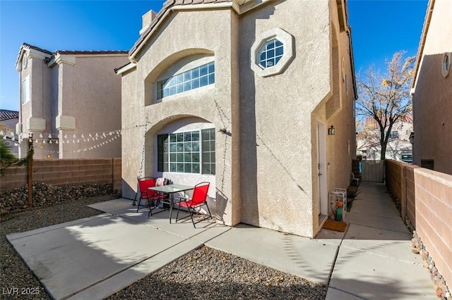 rear view of property with a patio area