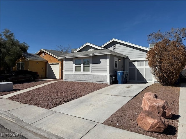 single story home with a garage