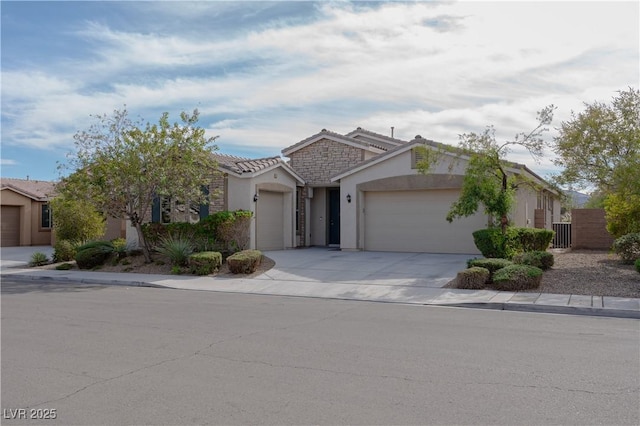 view of front of property with a garage