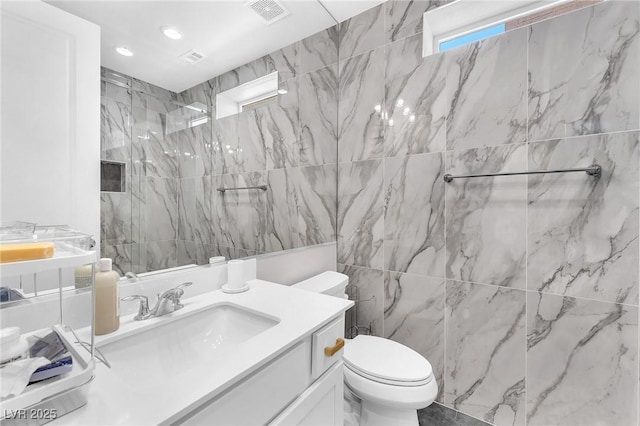2503 Cracked Stone St, Henderson, NV 89044 - full bath featuring recessed lighting, visible vents, toilet, vanity, and walk in shower