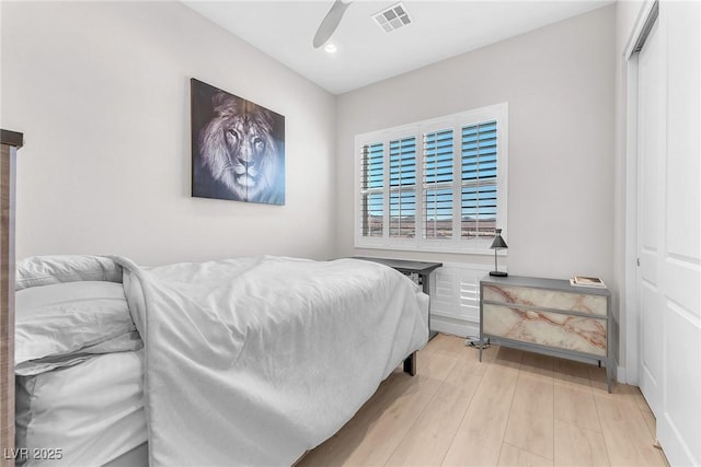 2503 Cracked Stone St, Henderson, NV 89044 - bedroom featuring light wood-style flooring, visible vents, and a ceiling fan