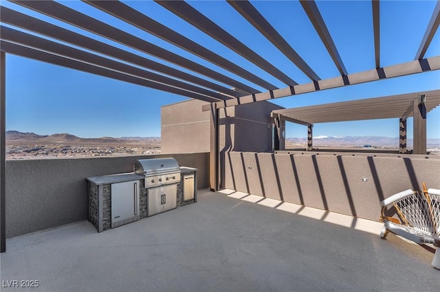 2503 Cracked Stone St, Henderson, NV 89044 - view of patio featuring a mountain view, a pergola, and area for grilling