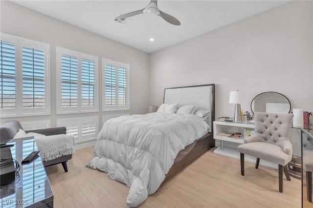 2503 Cracked Stone St, Henderson, NV 89044 - bedroom with light wood-type flooring, visible vents, ceiling fan, and recessed lighting