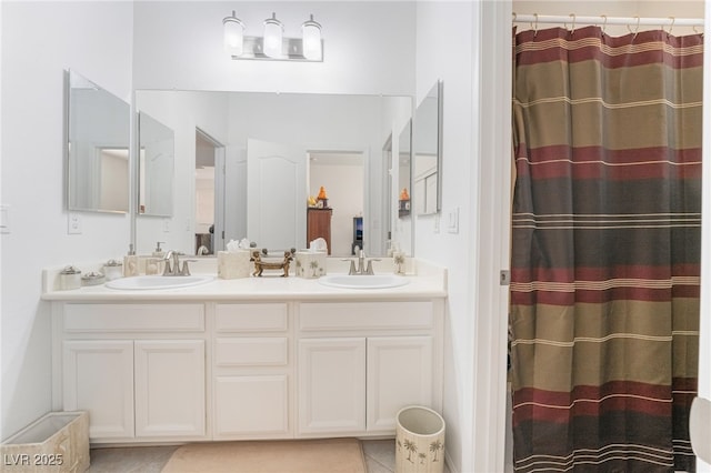 bathroom with vanity, tile patterned flooring, and a shower with curtain