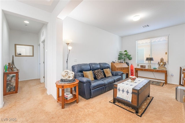 living room with light colored carpet