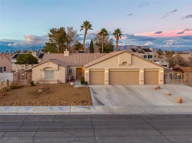 view of front of property with a garage