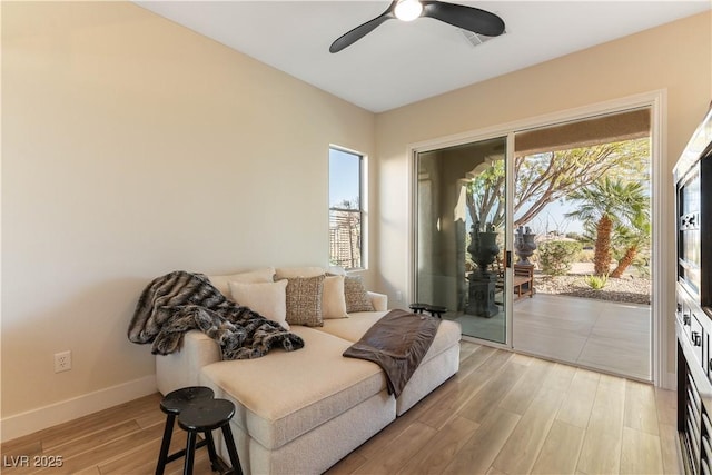 4796 Riva De Romanza St, Las Vegas, NV 89135 - living area featuring light wood-style flooring and ceiling fan