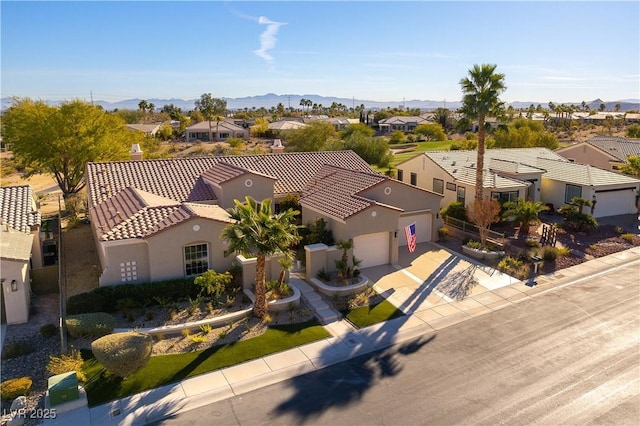 4796 Riva De Romanza St, Las Vegas, NV 89135 - aerial perspective of suburban area featuring mountains