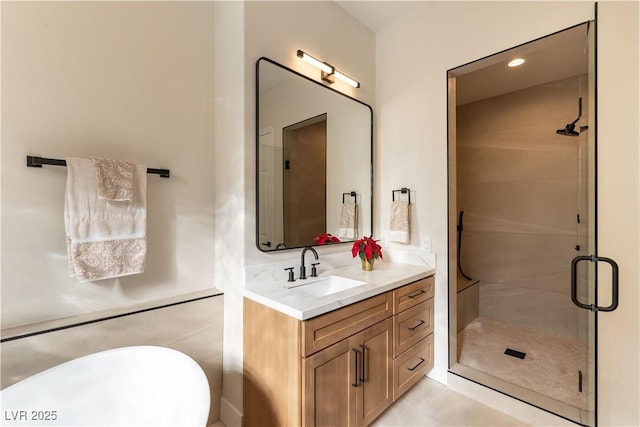 4796 Riva De Romanza St, Las Vegas, NV 89135 - bathroom with vanity, a shower stall, and a freestanding tub
