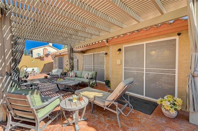 view of patio / terrace featuring a pergola and outdoor lounge area