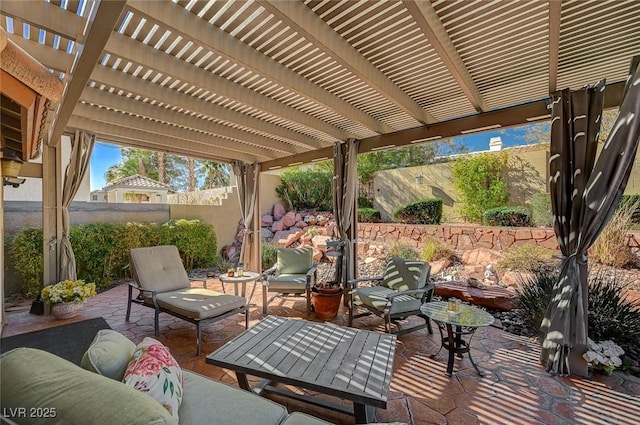 view of patio featuring a pergola and an outdoor hangout area