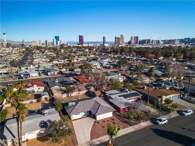 birds eye view of property featuring a city view