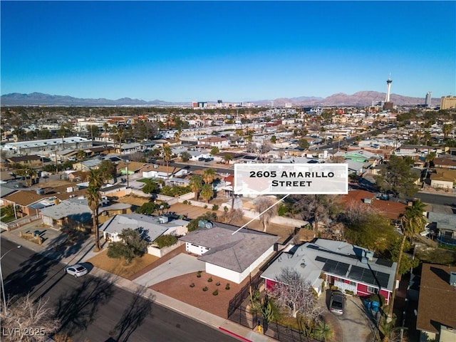 bird's eye view with a residential view and a mountain view