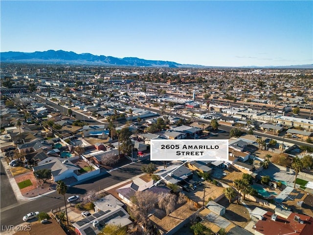 aerial view featuring a residential view and a mountain view