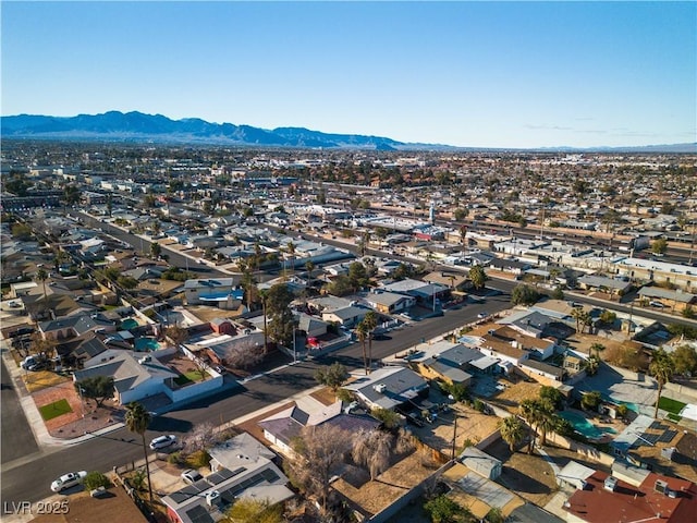 bird's eye view with a residential view and a mountain view