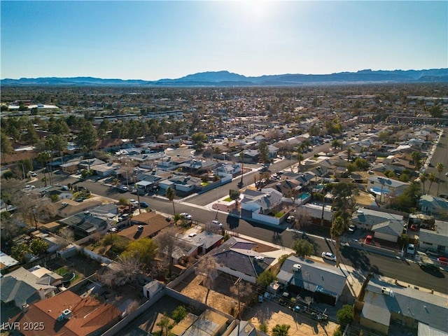 drone / aerial view with a residential view and a mountain view