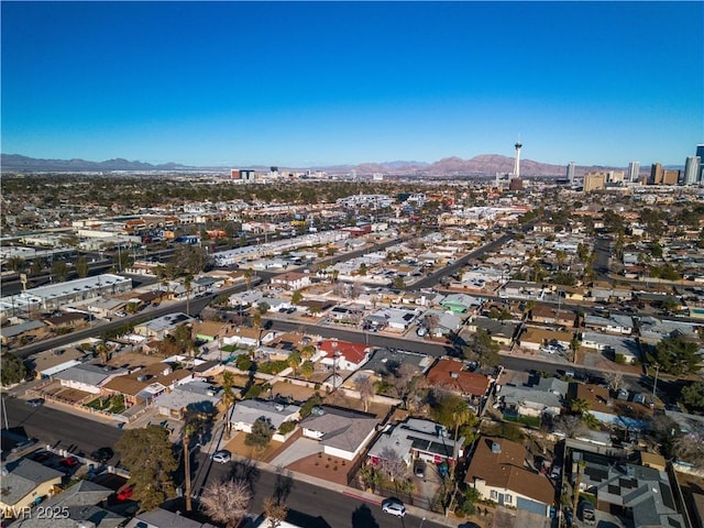 bird's eye view with a view of city, a mountain view, and a residential view