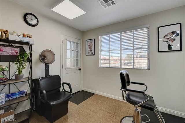 tiled office with visible vents and baseboards