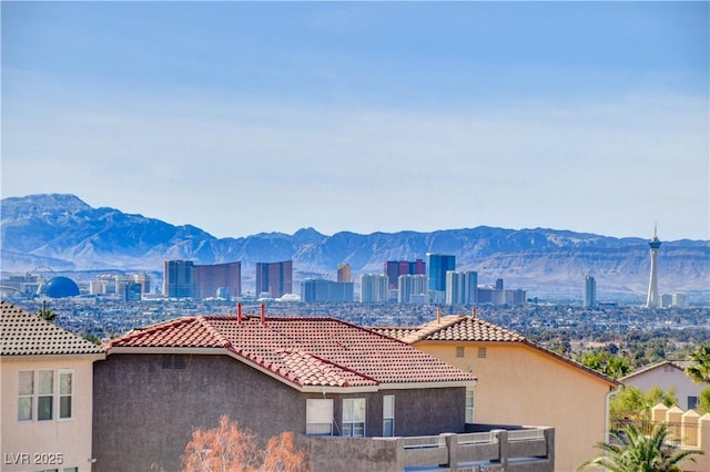 view of mountain feature with a view of city