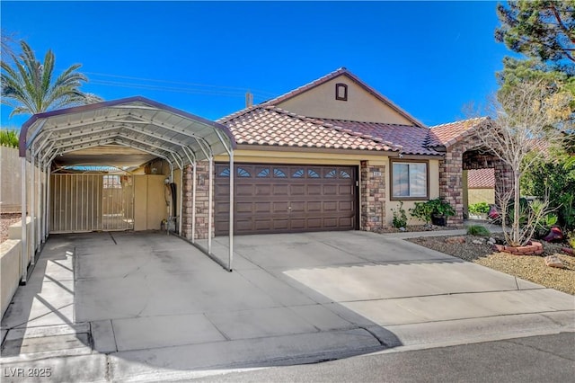 ranch-style home with concrete driveway, stucco siding, stone siding, an attached garage, and a tile roof
