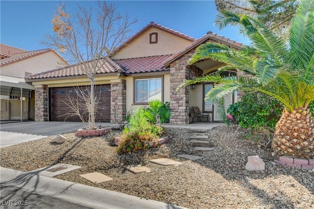 view of front of property featuring a tiled roof, stucco siding, stone siding, an attached garage, and concrete driveway