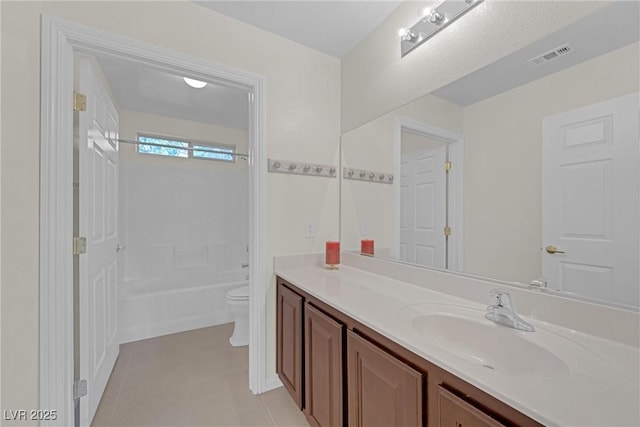 full bathroom featuring tile patterned flooring, vanity, toilet, and washtub / shower combination