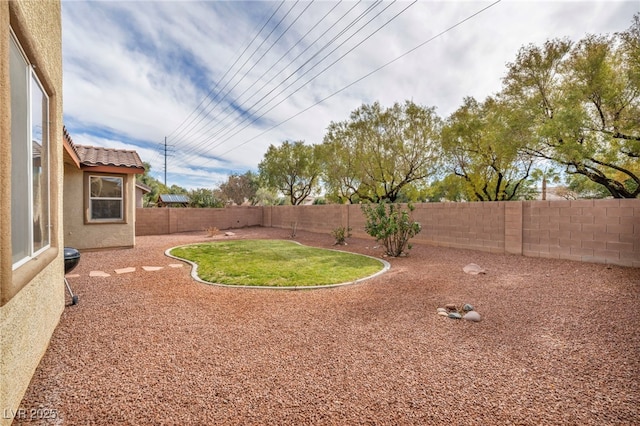 view of yard featuring a fenced backyard