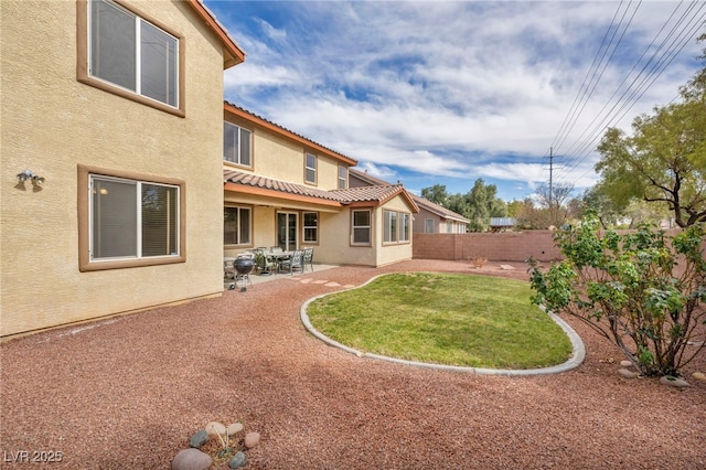 view of yard with a patio and a fenced backyard