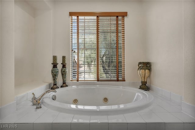 bathroom with a whirlpool tub