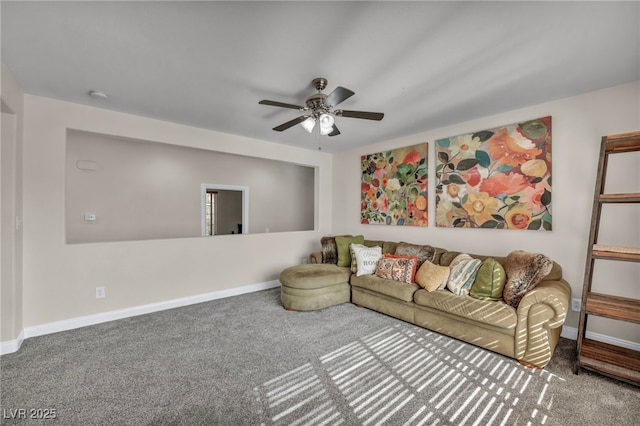 carpeted living room with baseboards and ceiling fan