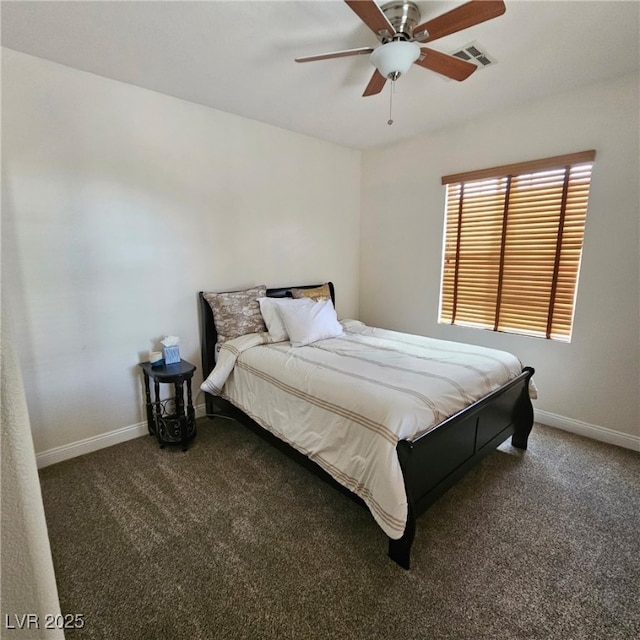 bedroom featuring visible vents, baseboards, carpet, and a ceiling fan