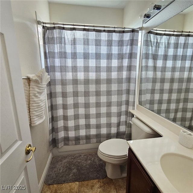 full bath featuring tile patterned flooring, shower / bath combo with shower curtain, toilet, and vanity