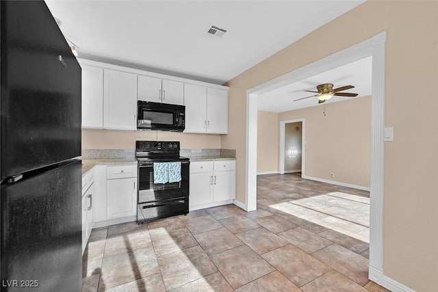 kitchen with ceiling fan, light tile patterned flooring, white cabinetry, and black appliances