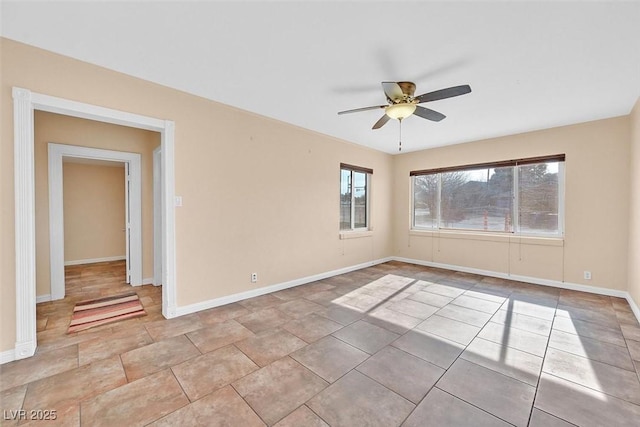 spare room featuring ceiling fan