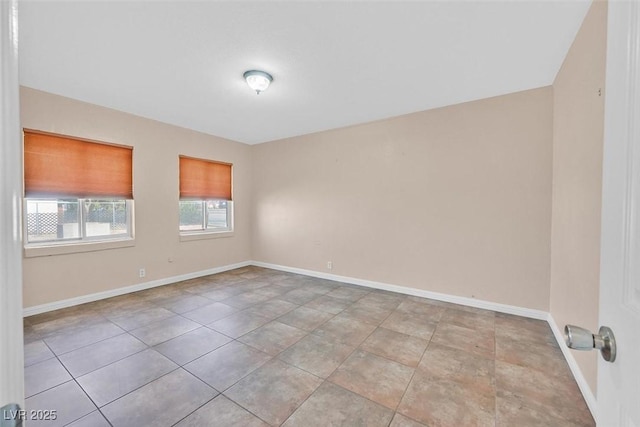 view of tiled spare room