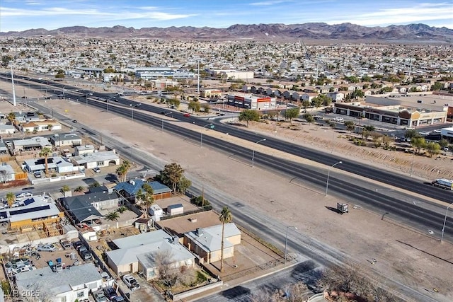 drone / aerial view featuring a mountain view