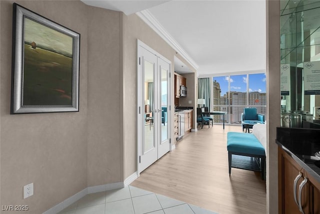 145 E Harmon Ave Unit 2603, Las Vegas, NV 89109 - hallway with french doors and a desk