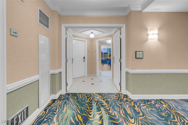 145 E Harmon Ave Unit 2603, Las Vegas, NV 89109 - corridor featuring baseboards, tile patterned floors, and crown molding