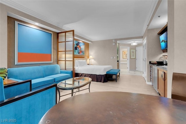 145 E Harmon Ave Unit 2603, Las Vegas, NV 89109 - bedroom featuring wood finished floors, baseboards, and crown molding